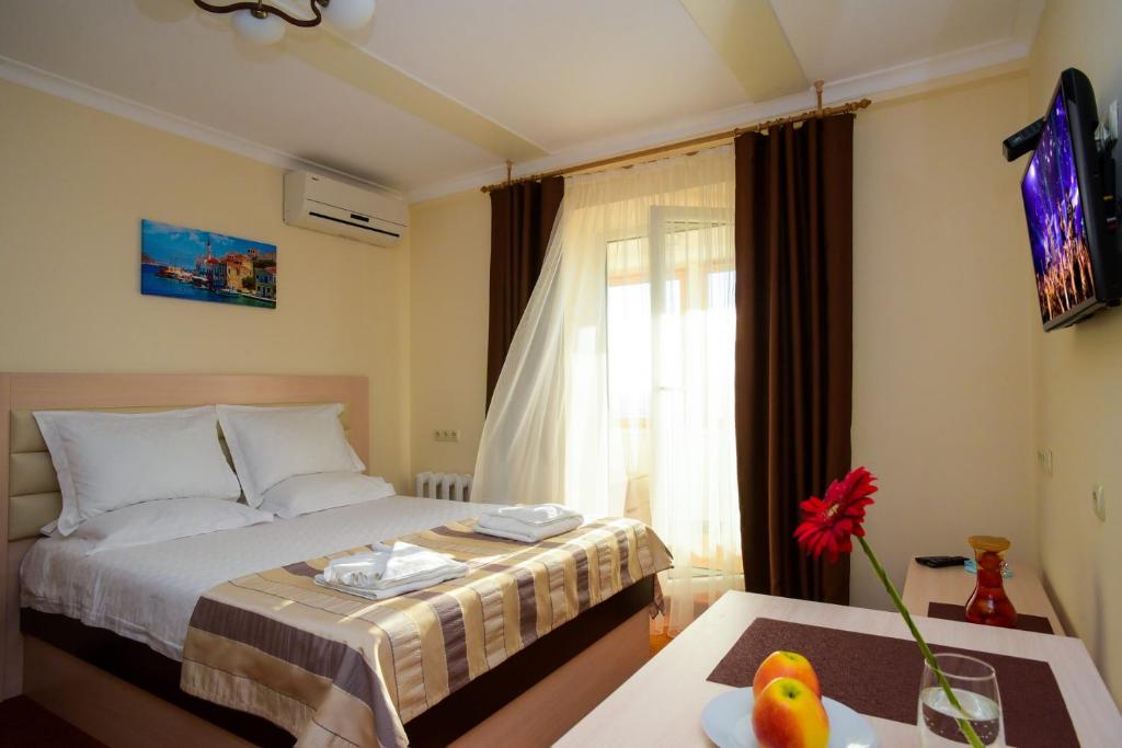 Posteľ alebo postele v izbe v ubytovaní ApartHotel on Klinichna st. (1st entrance)