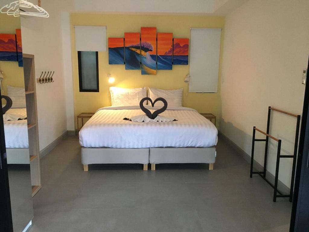 Postelja oz. postelje v sobi nastanitve Baan Andaman Sea Surf