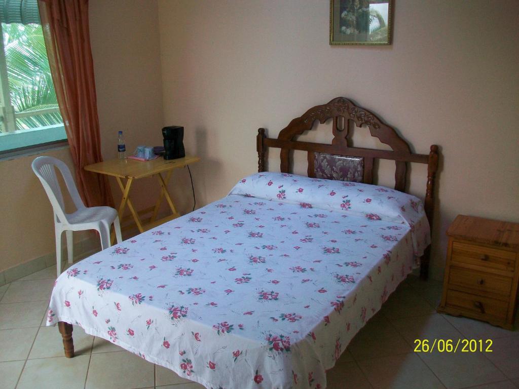 Postel nebo postele na pokoji v ubytování Hostal Cabañas Vistamar