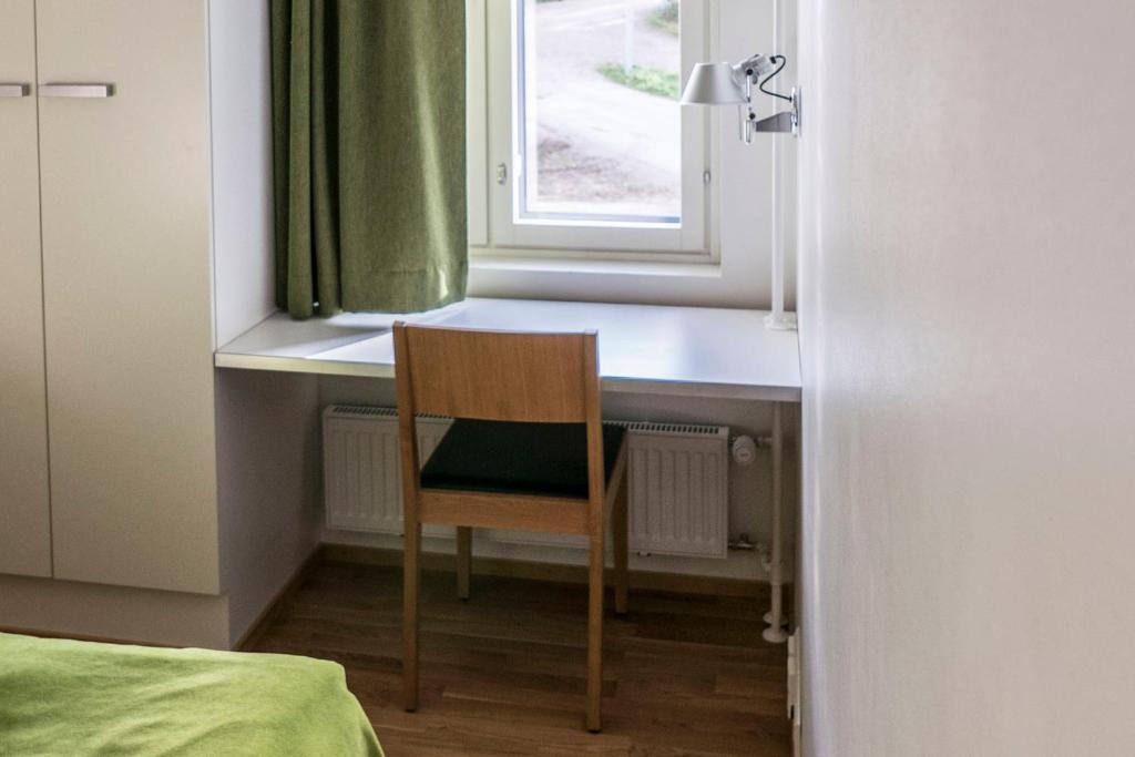 Кровать или кровати в номере Vuokatti Sport Chalets