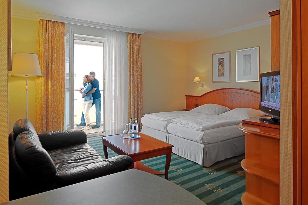 Postel nebo postele na pokoji v ubytování Ringhotel Strandblick
