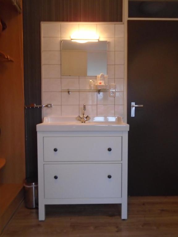 Koupelna v ubytování Hotel de Vriezerbrug
