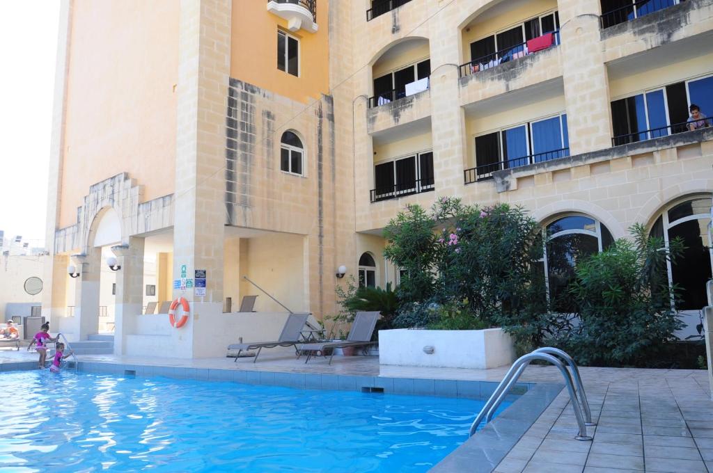 Bazén v ubytování Il Palazzin Hotel nebo v jeho okolí