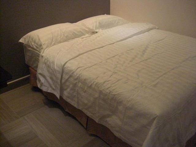 Postel nebo postele na pokoji v ubytování Marvelot Hotel