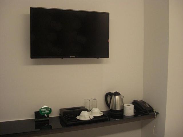 TV a/nebo společenská místnost v ubytování Marvelot Hotel