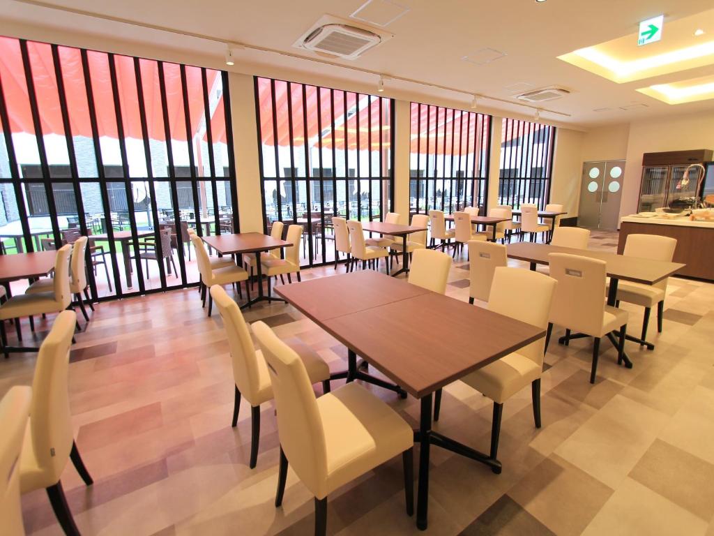 Restoran või mõni muu söögikoht majutusasutuses Henn na Hotel Laguna Ten Bosch