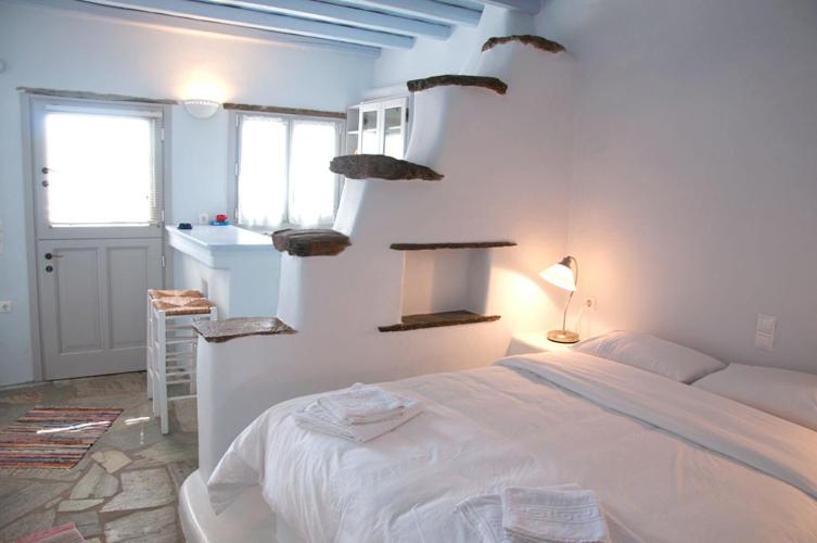 Postel nebo postele na pokoji v ubytování Vega Apartments
