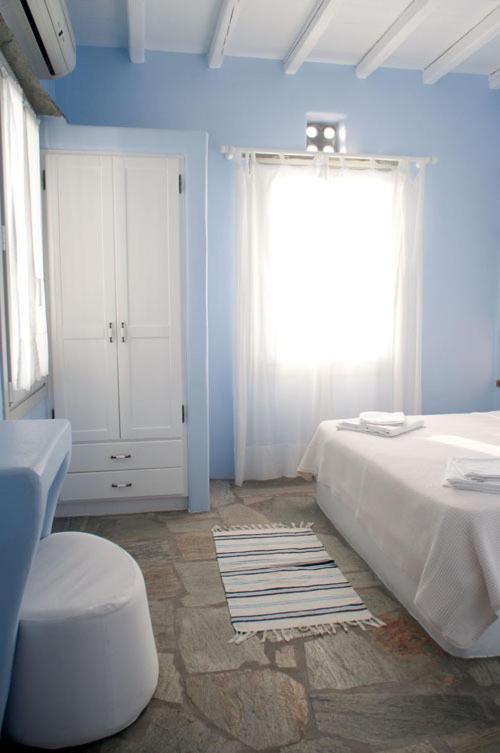 Postel nebo postele na pokoji v ubytování Vega Apartments