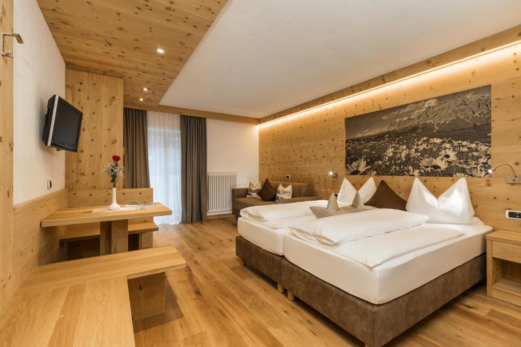 Postel nebo postele na pokoji v ubytování Hotel Bel Sit
