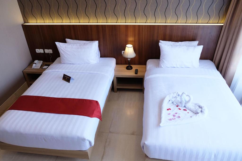 Postel nebo postele na pokoji v ubytování Mexolie Hotel