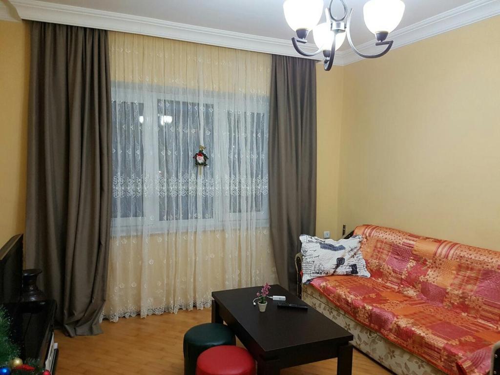 Μια τηλεόραση ή/και κέντρο ψυχαγωγίας στο Apartament Roman
