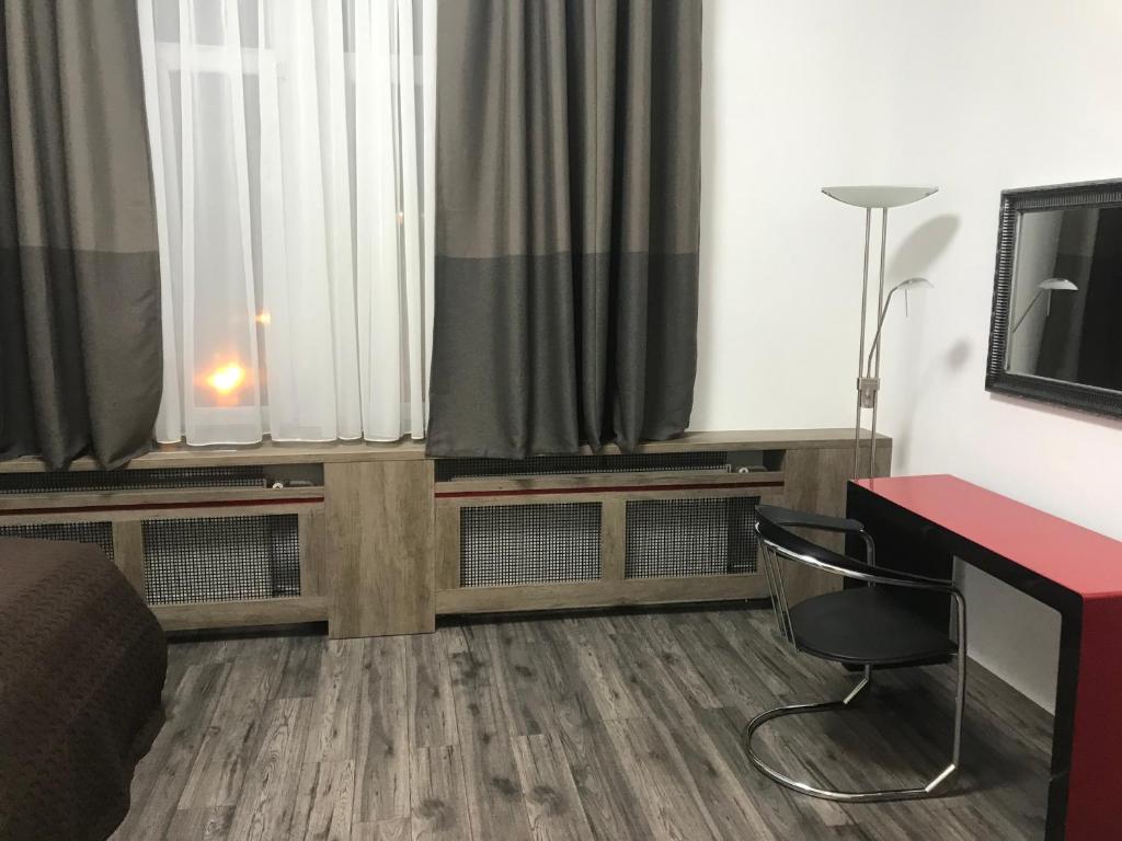 TV a/nebo společenská místnost v ubytování Old Town Boutique Apartments