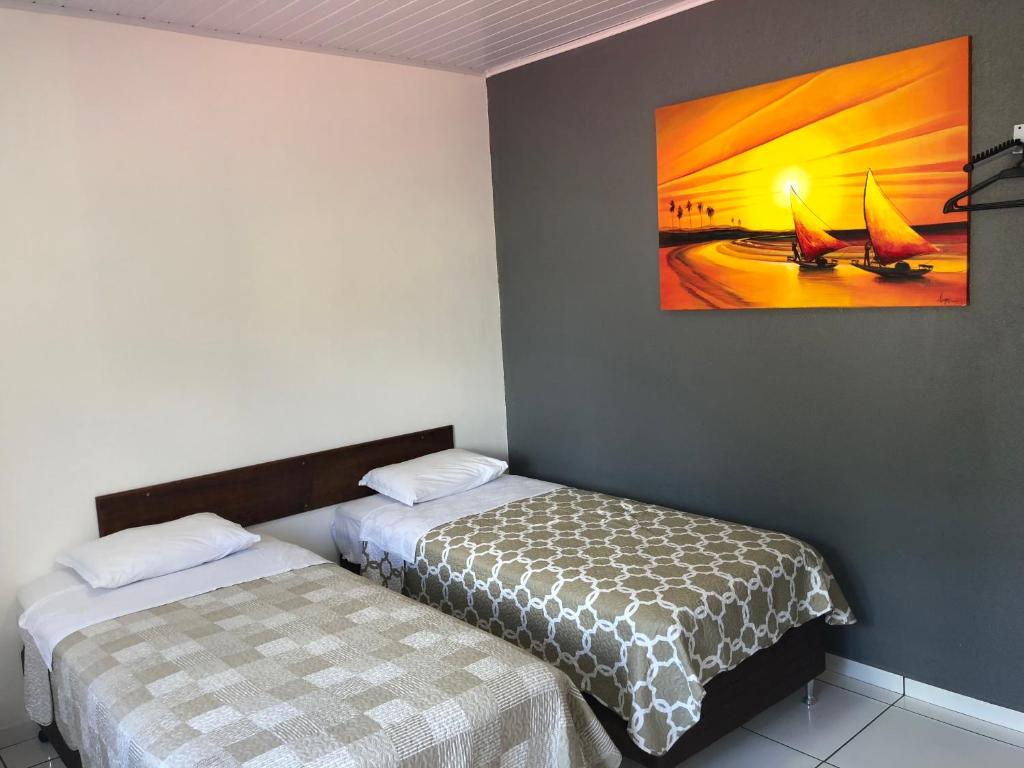 Postel nebo postele na pokoji v ubytování Hotel Armenia