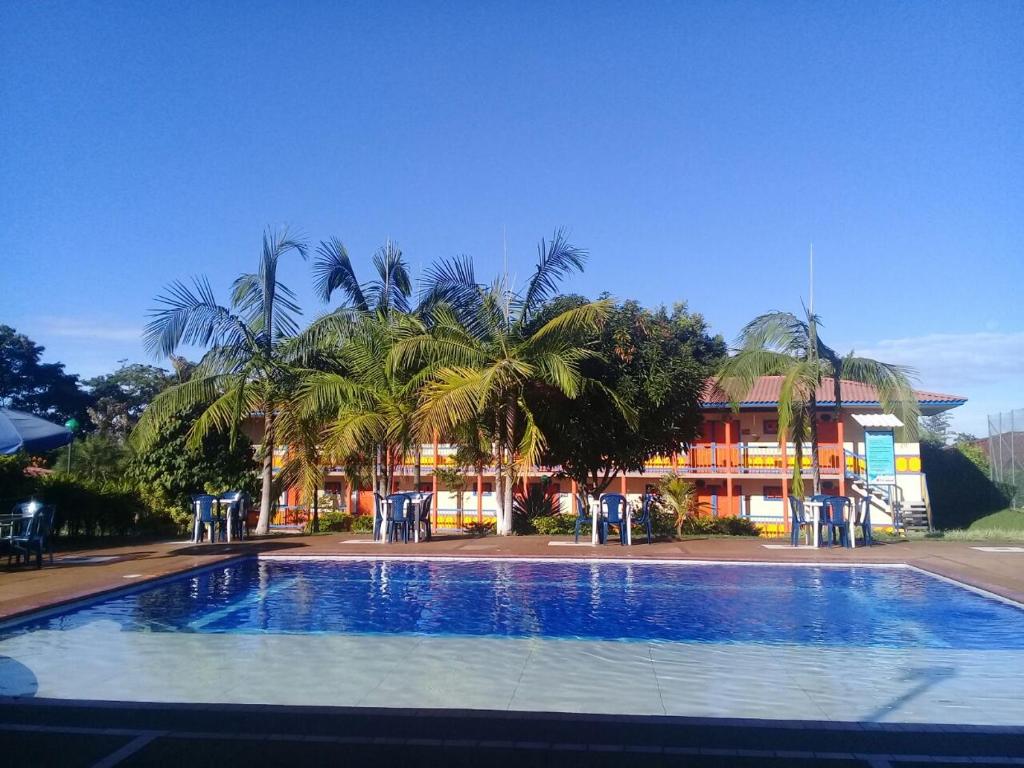 The swimming pool at or near Hotel Campestre Tacurrumbi