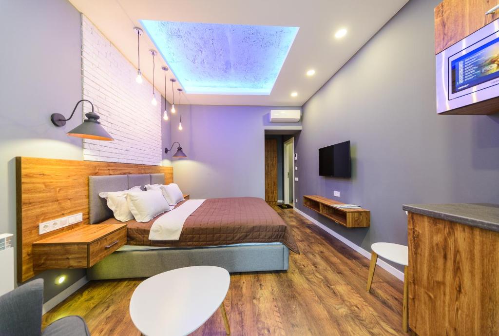 TV a/nebo společenská místnost v ubytování Partner Guest House Baseina