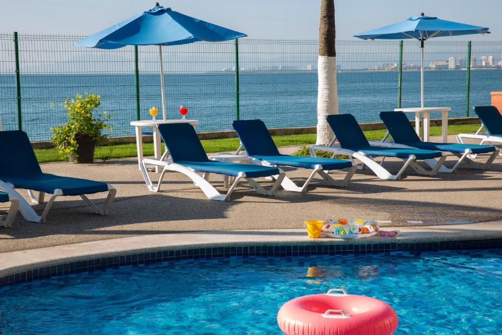 Bazén v ubytování Hotel El Pescador nebo v jeho okolí