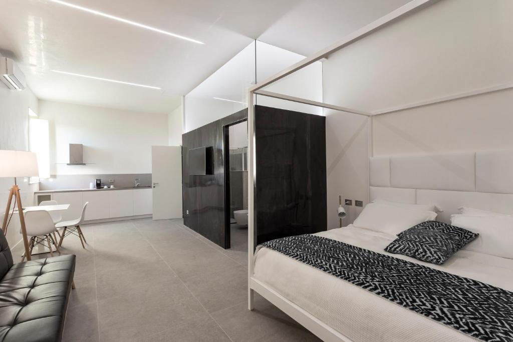 Postel nebo postele na pokoji v ubytování Nostos rooms & Apartments