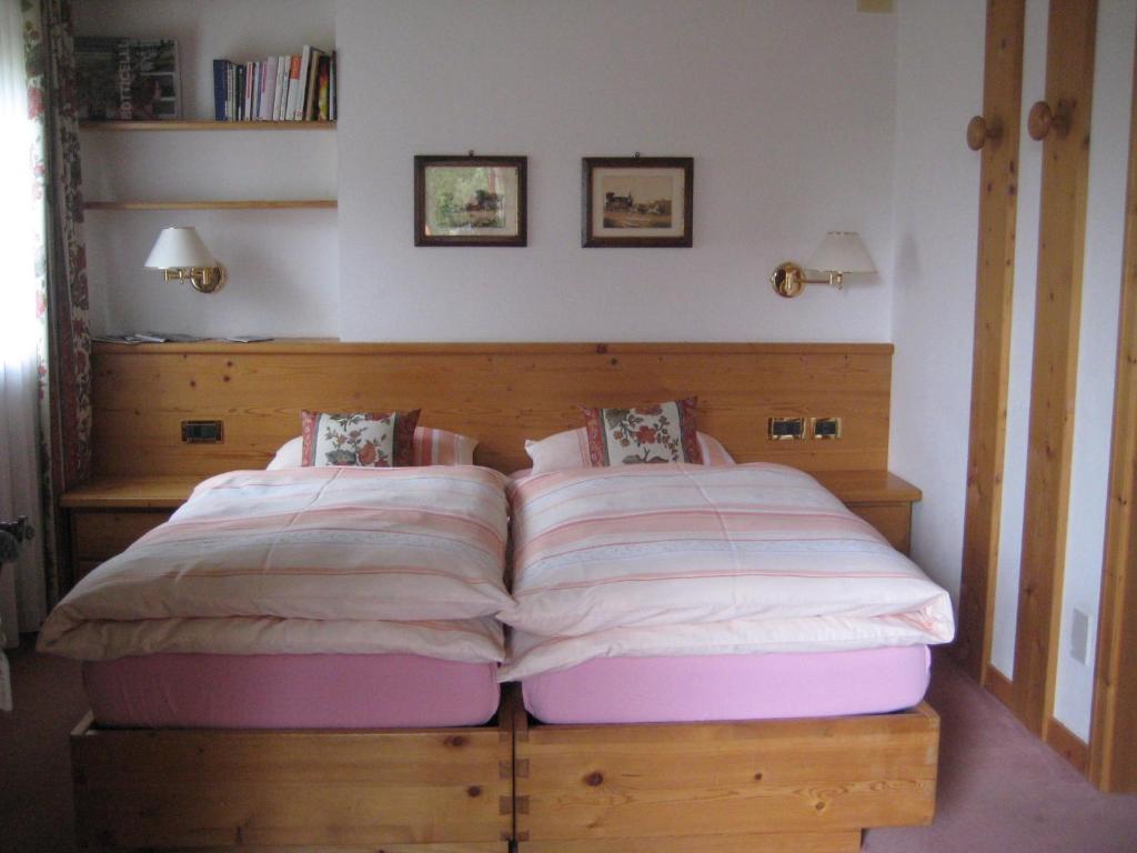 Postel nebo postele na pokoji v ubytování B&B Ciasa Weber