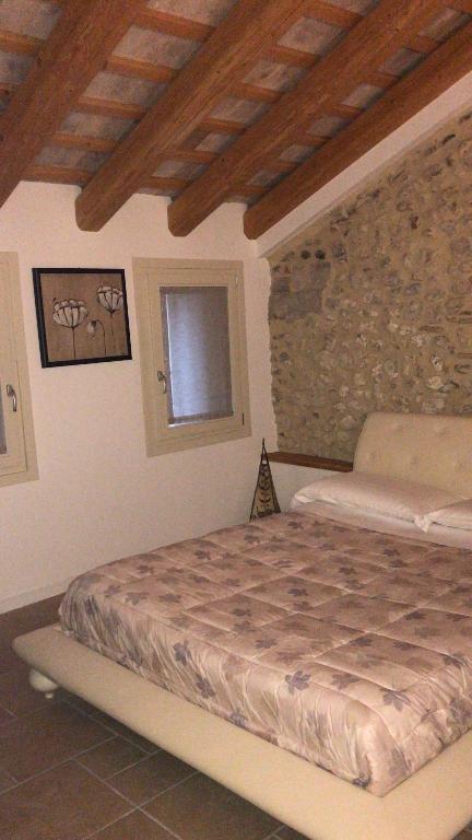 Postel nebo postele na pokoji v ubytování B&B Agli Angeli