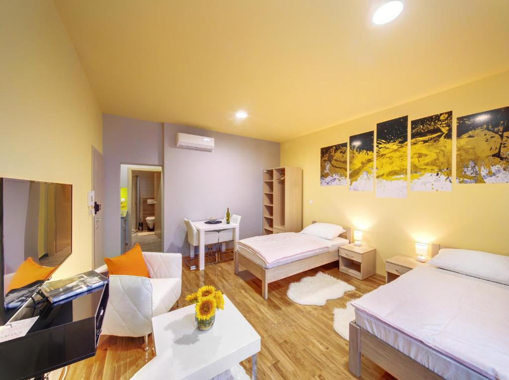 Postel nebo postele na pokoji v ubytování Apartments Postic