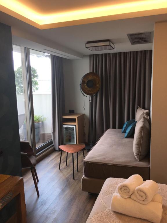 Postel nebo postele na pokoji v ubytování 360Degrees Pop Art Hotel