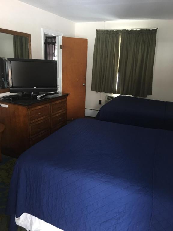 Postel nebo postele na pokoji v ubytování Anchor Motel