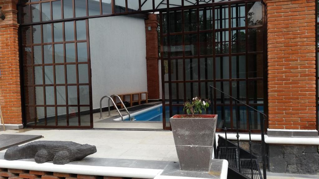 Bazén v ubytování Hotel Real Campestre Tepetoci nebo v jeho okolí