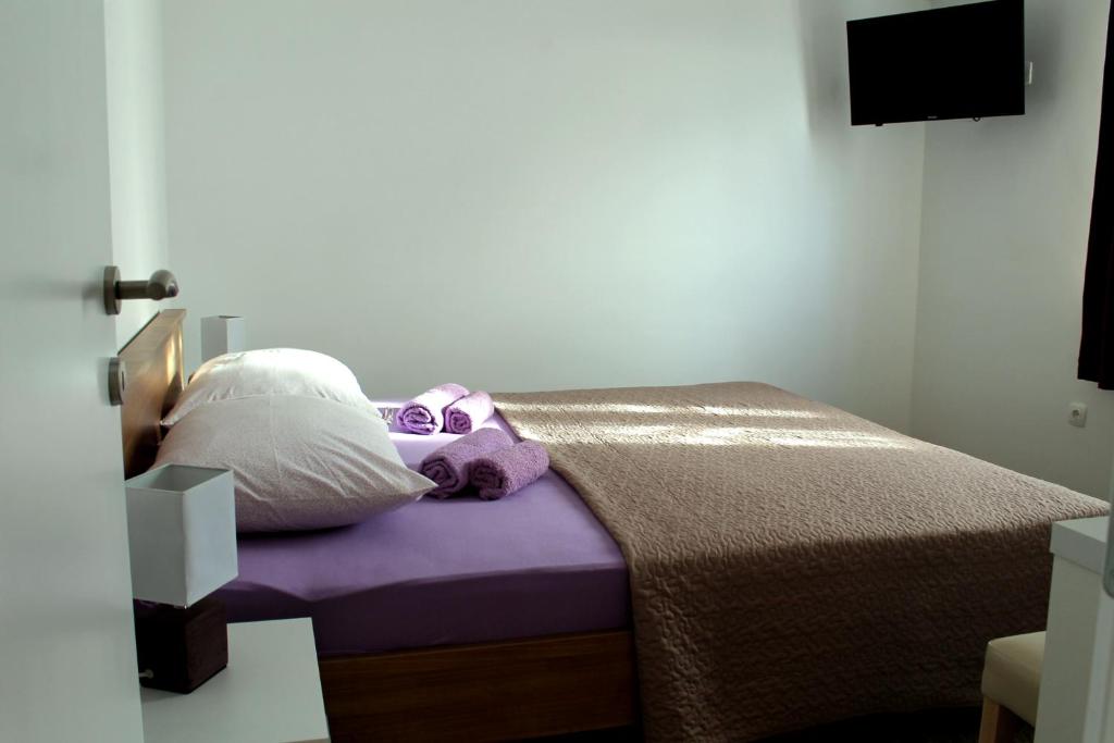Postel nebo postele na pokoji v ubytování Apartments Tea