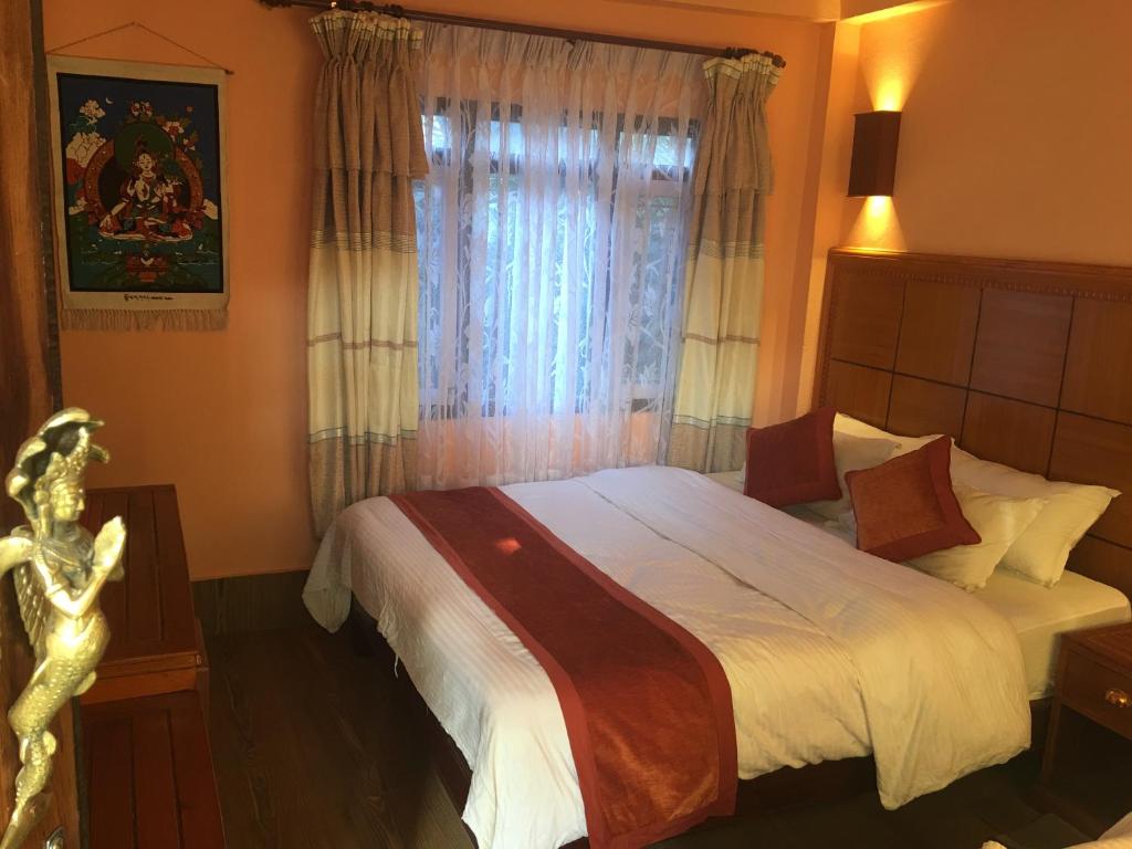 Kiwi Backpackers Hostel Pokhara 객실 침대