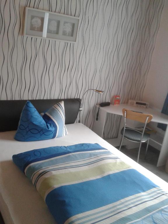 Postel nebo postele na pokoji v ubytování Hotel Waldschloss