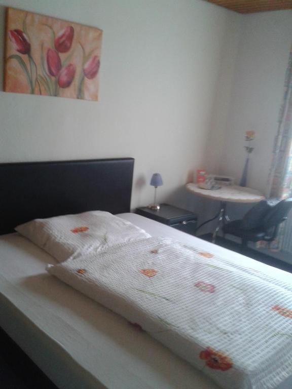Postel nebo postele na pokoji v ubytování Hotel Waldschloss