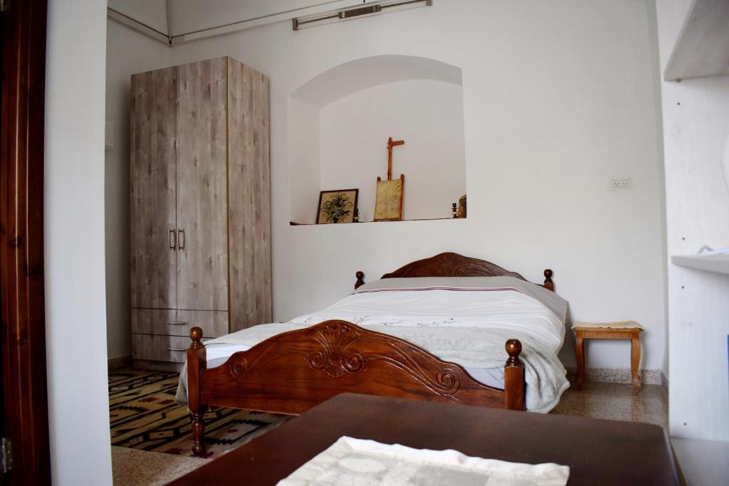 Кровать или кровати в номере Hosh Al Subbar
