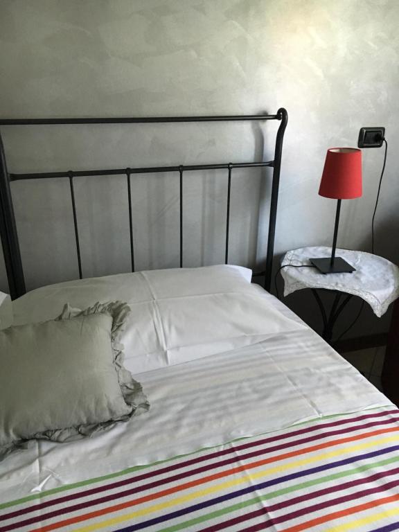 Postel nebo postele na pokoji v ubytování Casa Chiara B&B