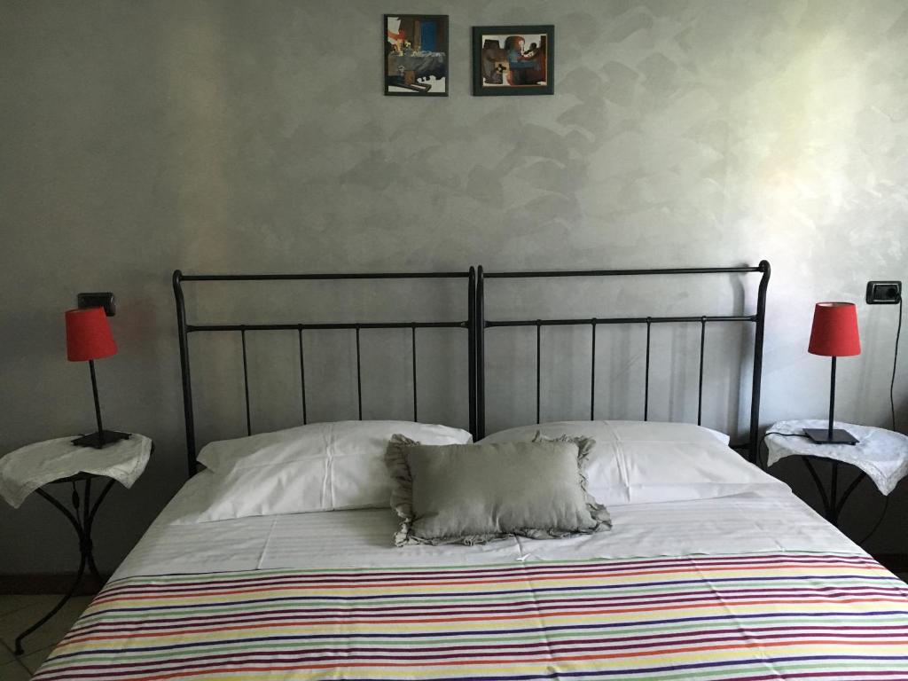 Postel nebo postele na pokoji v ubytování Casa Chiara B&B