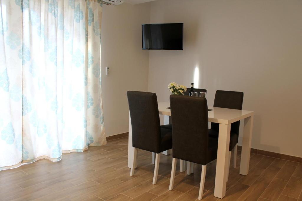 TV a/nebo společenská místnost v ubytování Apartments Tea