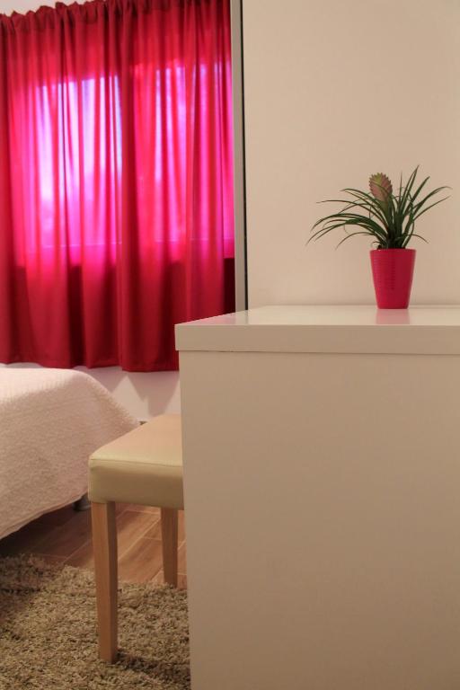Postel nebo postele na pokoji v ubytování Apartments Tea