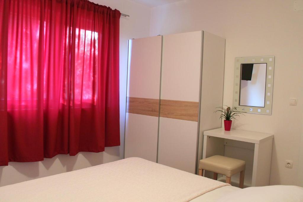 Postel nebo postele na pokoji v ubytování Apartments Tea