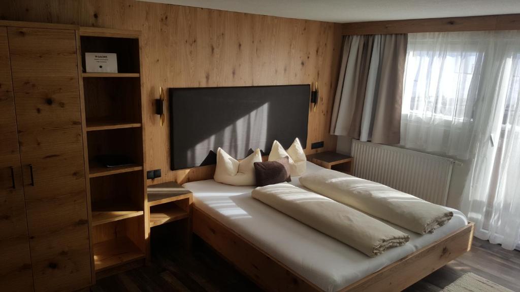 Postel nebo postele na pokoji v ubytování Pension Elisabeth