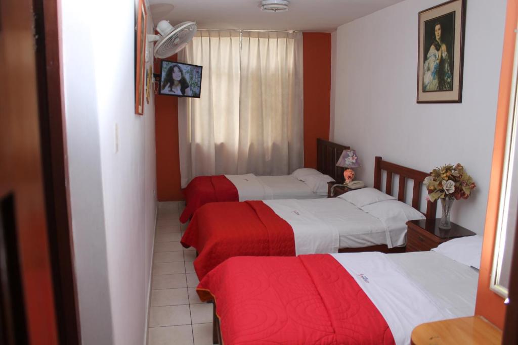 Postel nebo postele na pokoji v ubytování Hotel San José