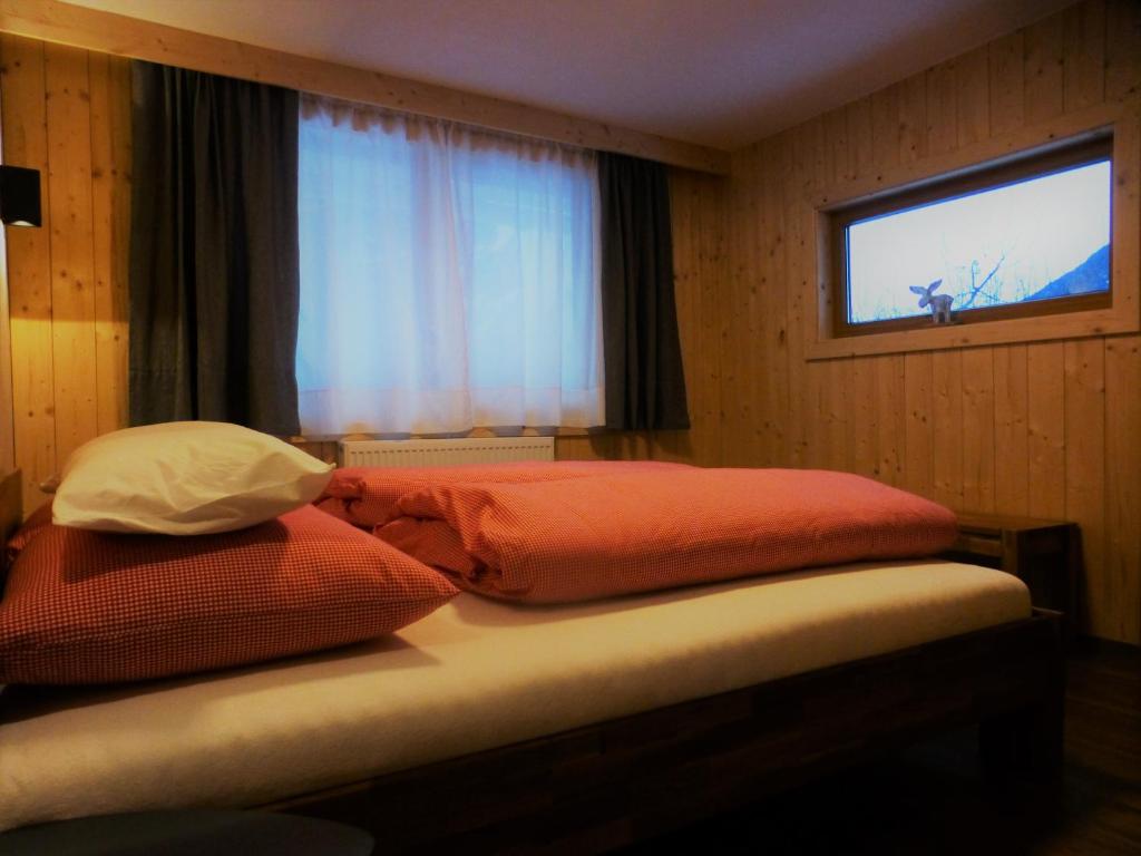 Posteľ alebo postele v izbe v ubytovaní Chalet Auszeit
