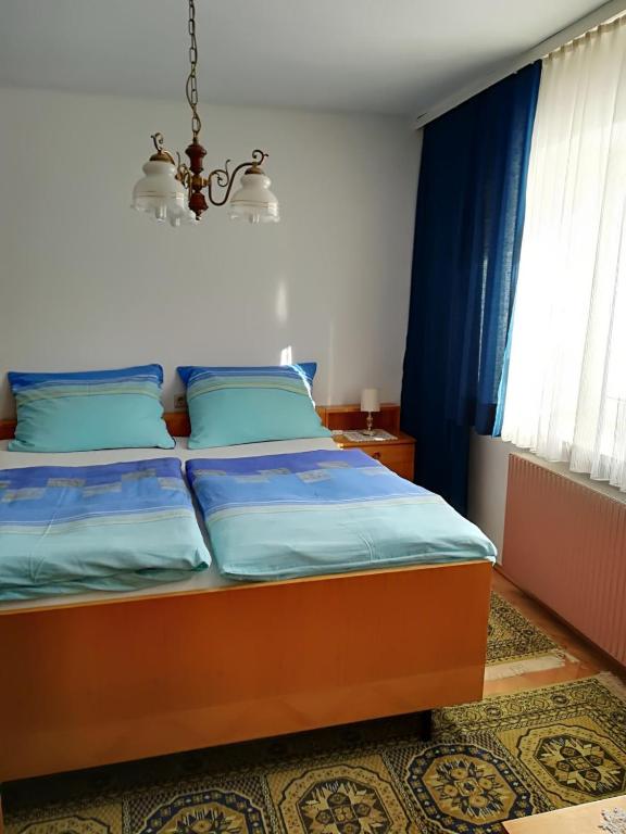 Postel nebo postele na pokoji v ubytování Haus Berchtold