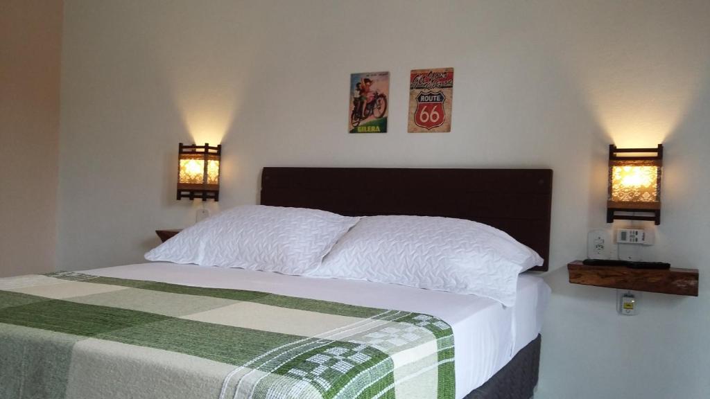 Cama ou camas em um quarto em Santa Monica Hospedaria