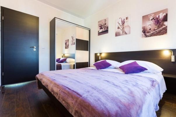 Posteľ alebo postele v izbe v ubytovaní Niki Apartment