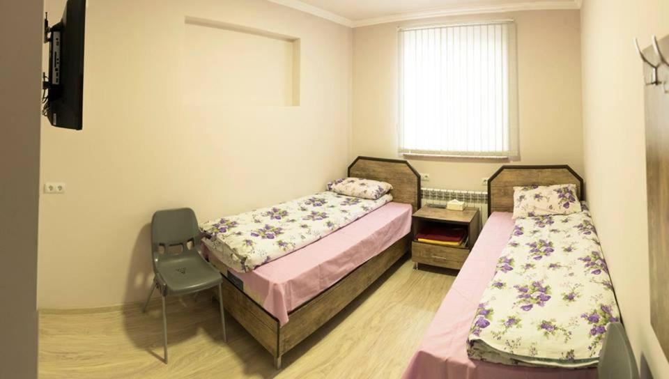 Postel nebo postele na pokoji v ubytování Hotel Amaras