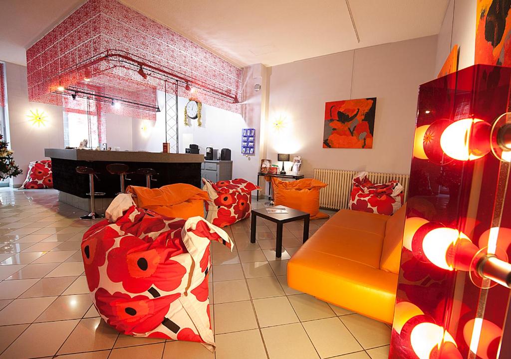 Posezení v ubytování CIT'HÔTEL LE DAV Clermont-Ferrand Centre
