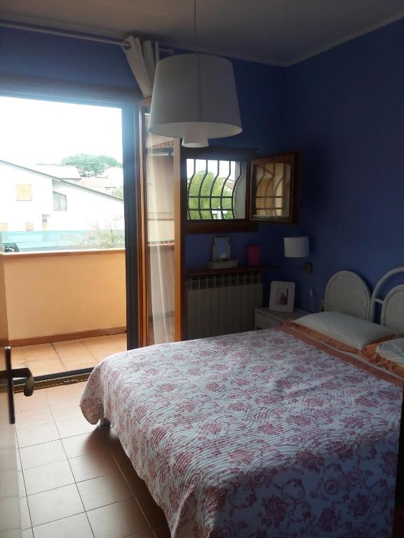 A bed or beds in a room at sole mare versilia