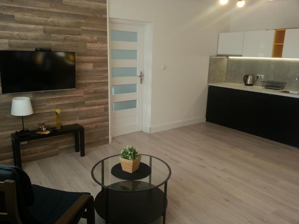 Kuchyňa alebo kuchynka v ubytovaní Willa Kolor Pokoje Apartamenty Restauracja