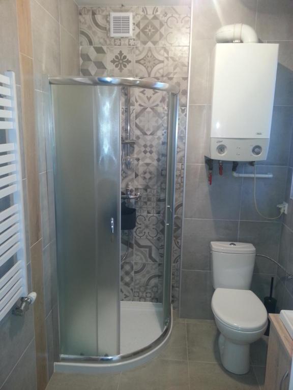 Kúpeľňa v ubytovaní Willa Kolor Pokoje Apartamenty Restauracja