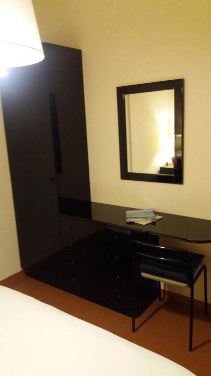 A bed or beds in a room at sole mare versilia