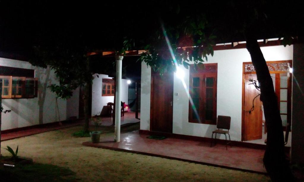 a house at night with a light on the door at Villa Agrico and Surf Guest in Weligama